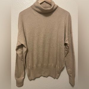 Madewell Women’s Turtleneck Sweater.